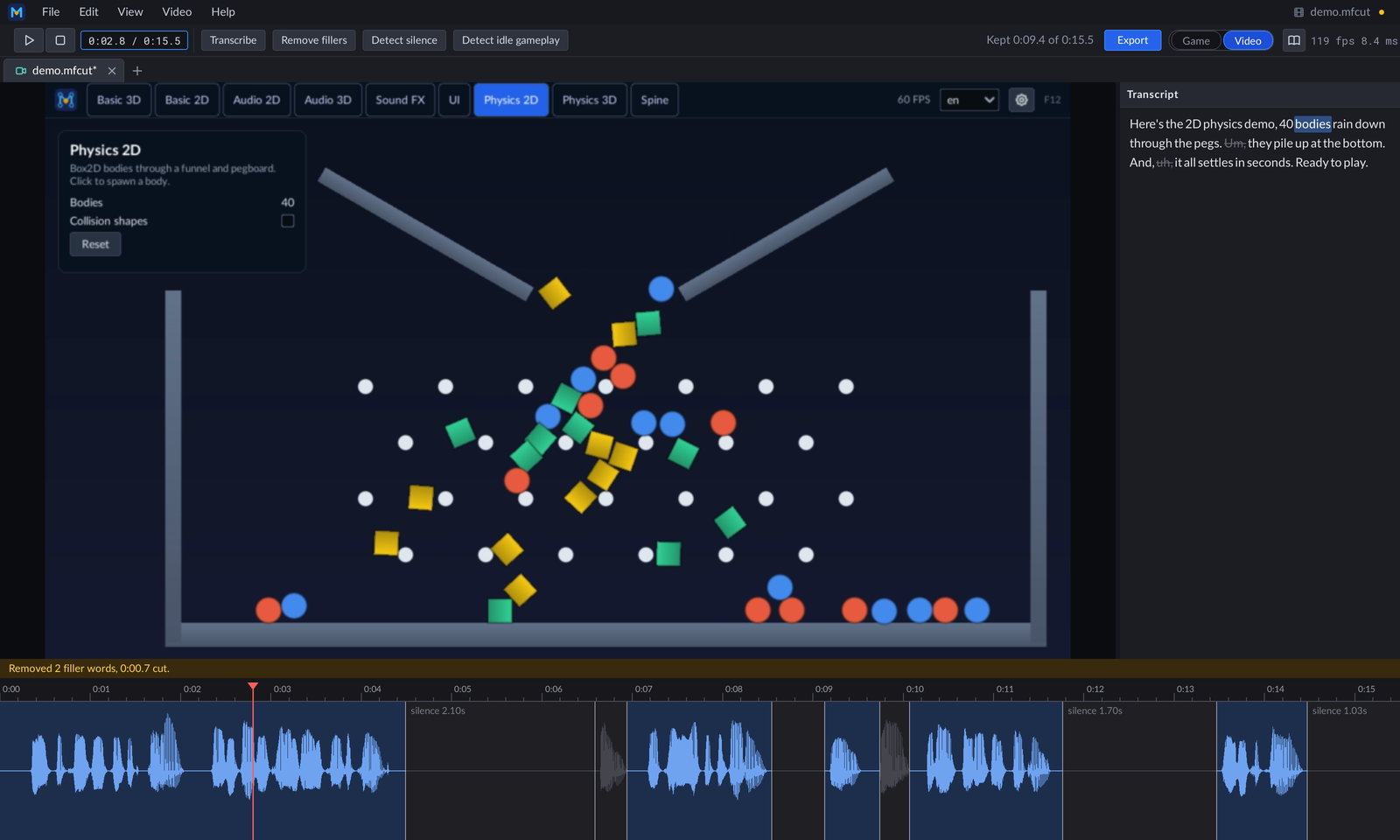 Video mode on a narrated recording of the Demo's Physics 2D scene: the preview, the transcript with the filler words struck through, and the timeline with silences and fillers cut